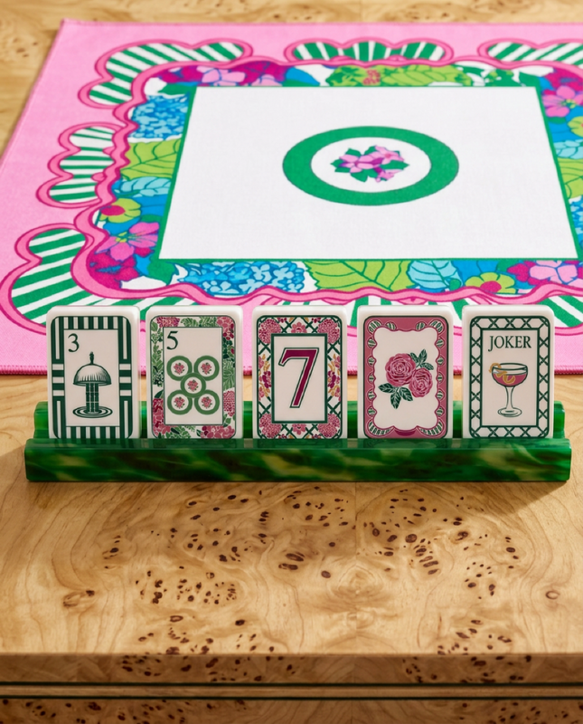 The Parlor Tiles | Caki Lawrence | Floral Resort Stripe tiles on green rack in front of mat