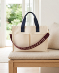 The Parlor Satchel in After Hours — cream canvas mahjong tote with navy handles and burgundy FFF 1234 NEWS DDD strap